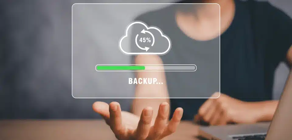 The image shows a backup in progress, emphasizing the importance of securing data.
